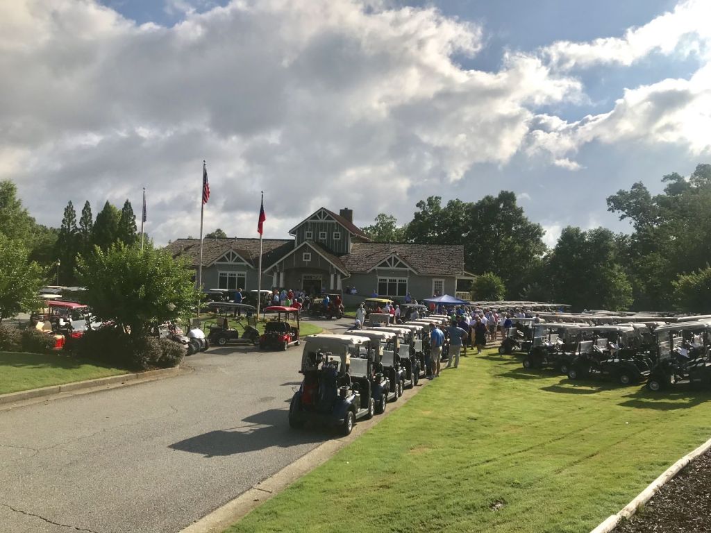 Clubhouse with carts lined up in the front